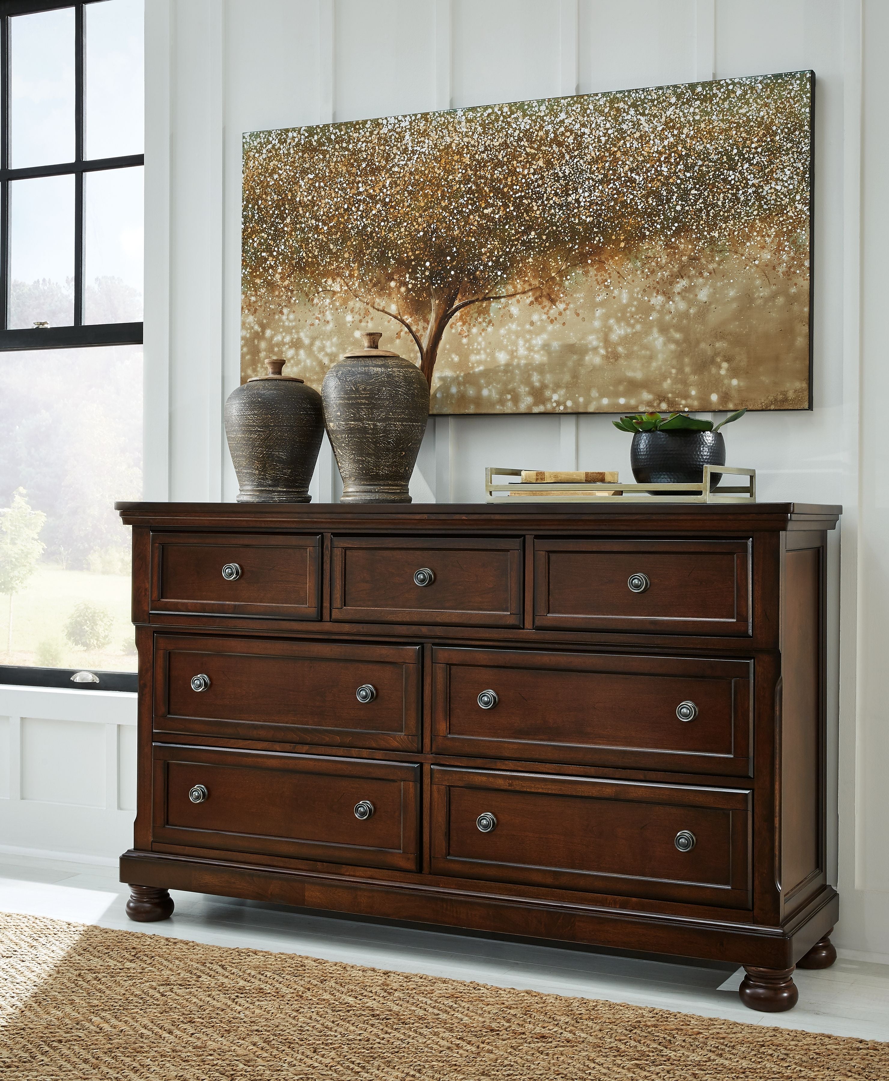 Porter dresser with arched mirror, rustic brown finish, rows of drawers with knobs