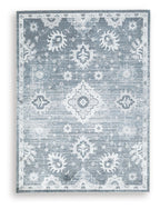 Gray washable rug with ornate medallion and floral pattern, distressed look