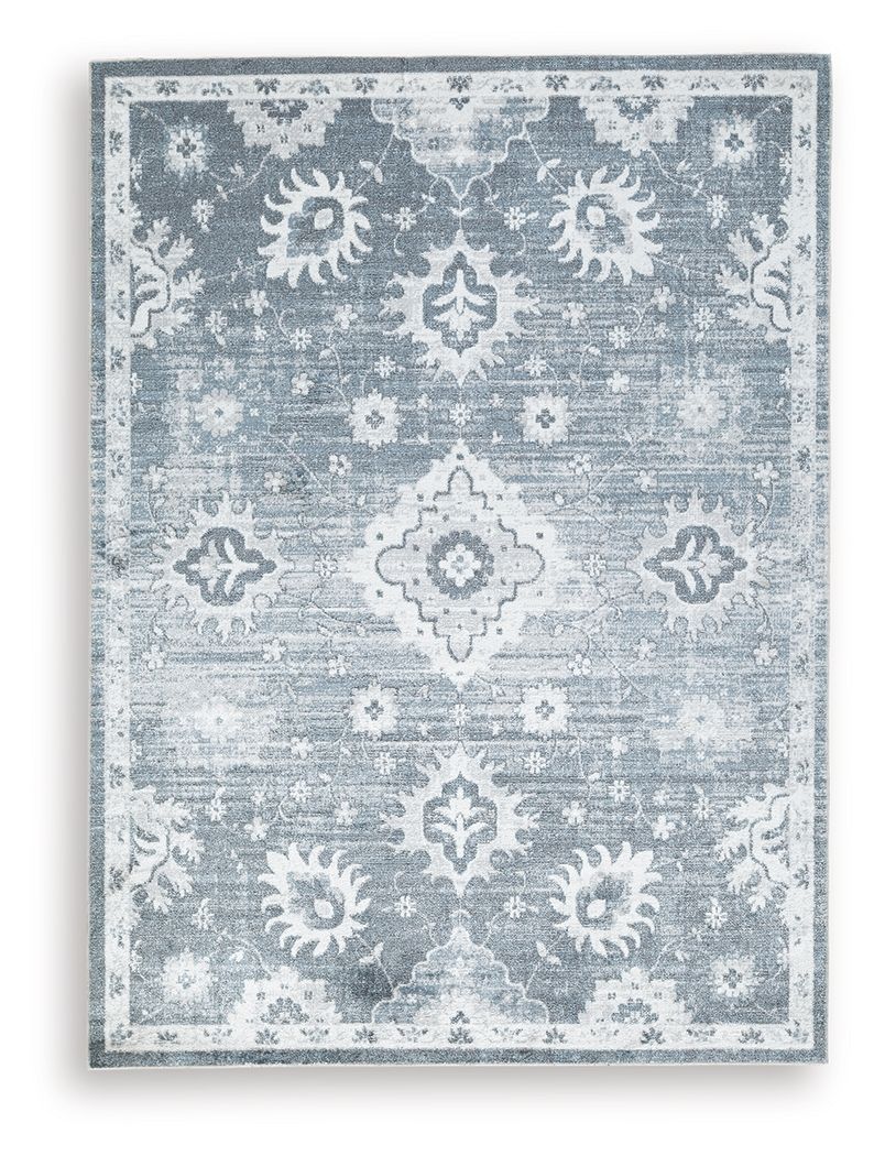 Gray washable rug with ornate medallion and floral pattern, distressed look