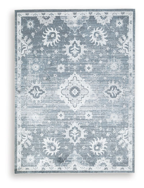 Gray washable rug with ornate medallion and floral pattern, distressed look