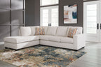 Light stone fabric sectional sofa with corner chaise and decorative patterned pillows