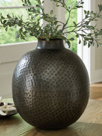 Dark gray hammered ceramic vase with gold-toned interior rim and dotted pattern