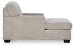 Pearl silver upholstered chaise chair with tufted back, track arms, and wide armrest