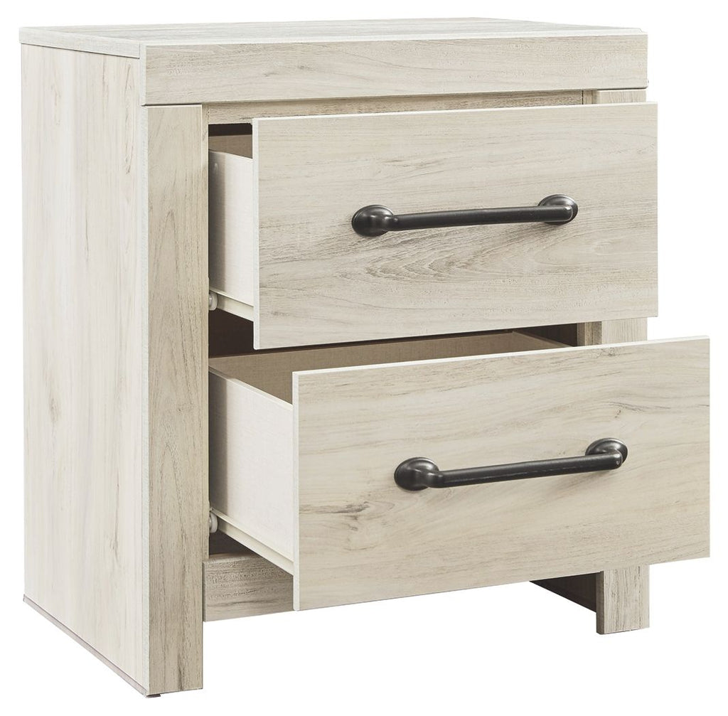 Whitewash two-drawer night stand with one drawer open and dark metal bar pulls