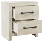 Whitewash two-drawer night stand with one drawer open and dark metal bar pulls
