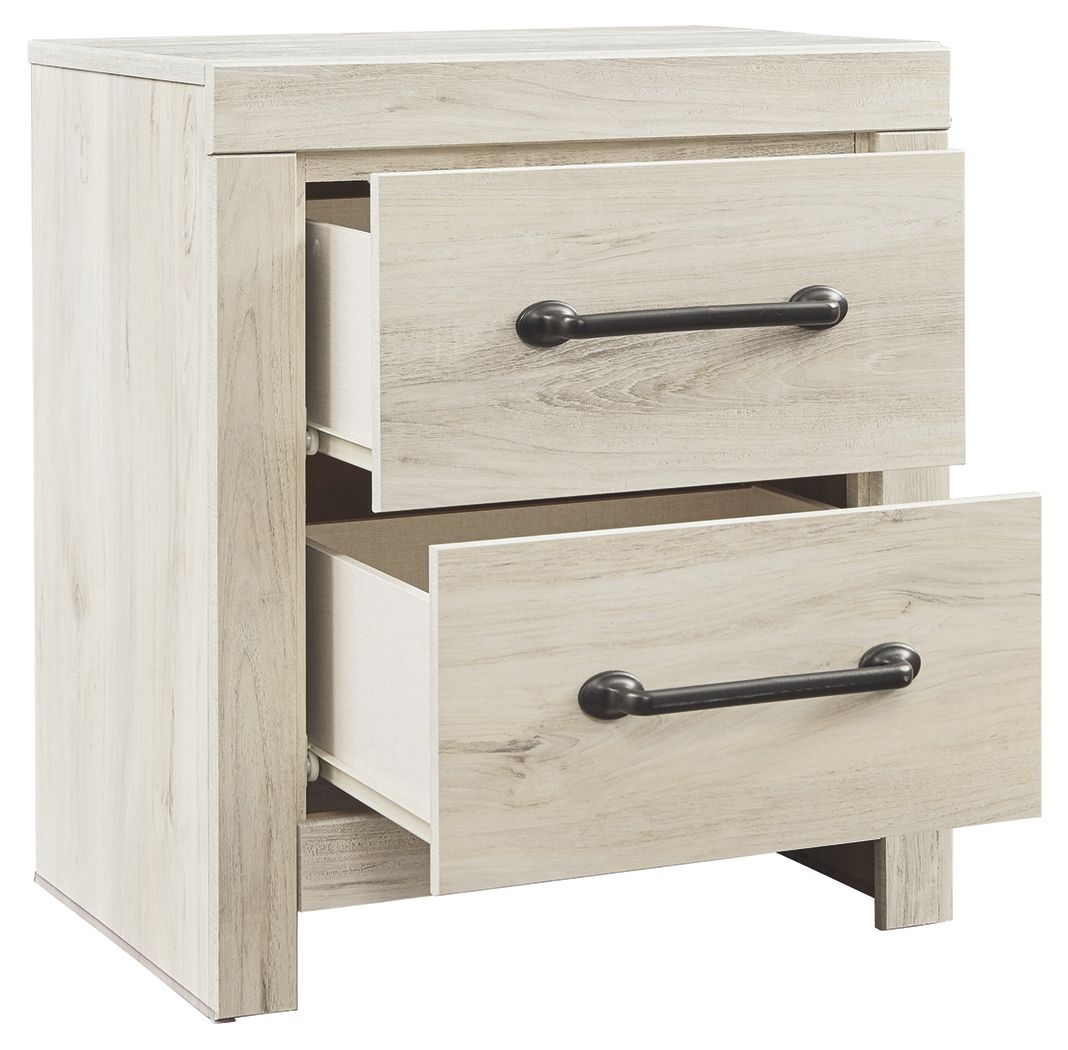 Whitewash two-drawer night stand with one drawer open and dark metal bar pulls