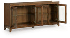 Medium brown accent cabinet with open glass doors, inner shelves, and brass pulls