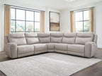 Gray power reclining sectional sofa with cushioned back and padded end armrests
