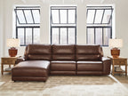 Power reclining sectional in dark brown faux leather with chaise footrest panels