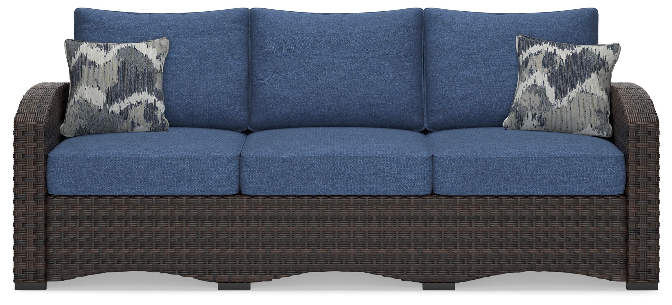 Outdoor sofa with blue seat cushions and back cushions, brown frame, two patterned pillows