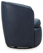Blue leather-look swivel chair side view with smooth back and cushioned armrest.
