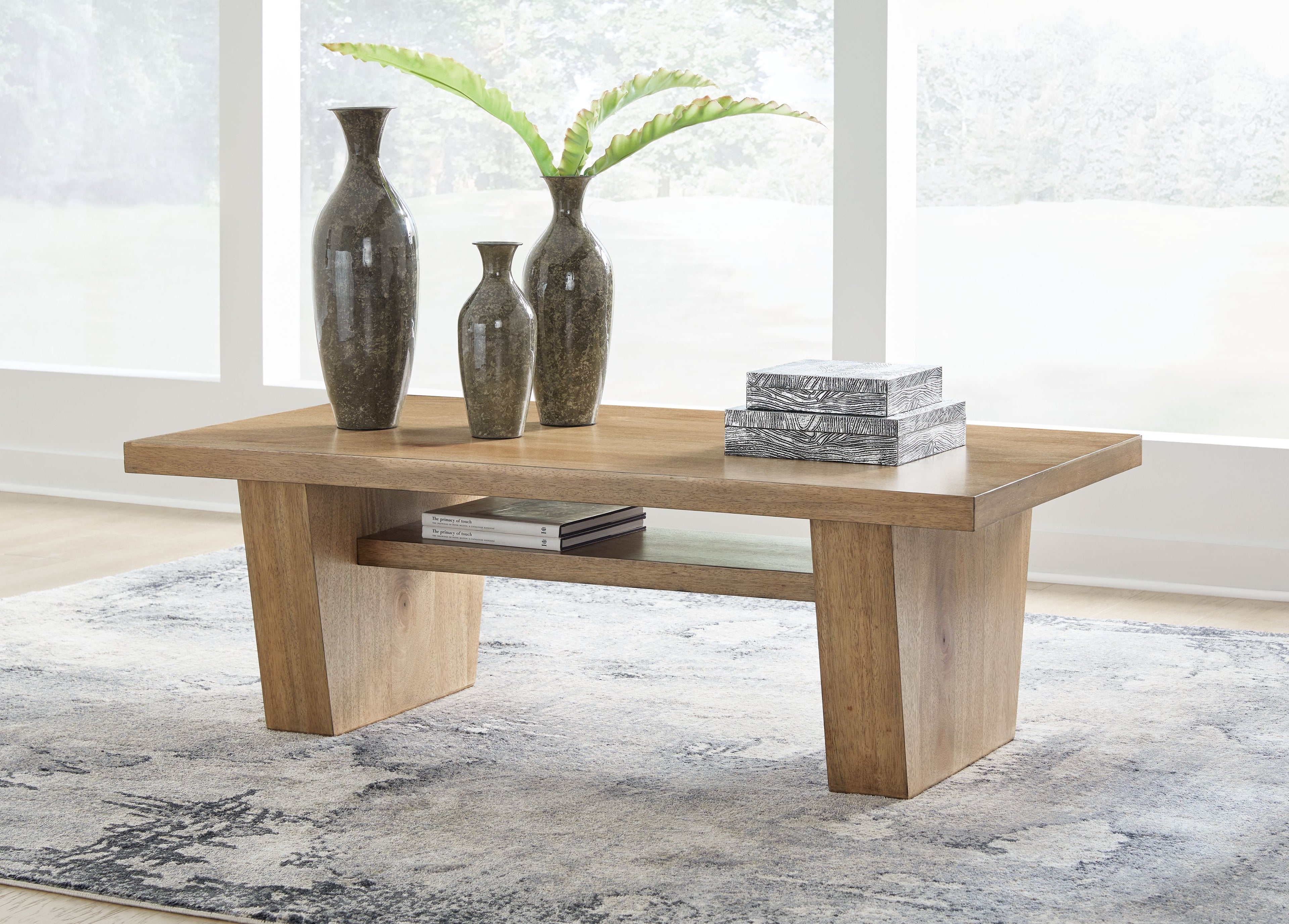 Rectangular light-brown wood cocktail table with open base
