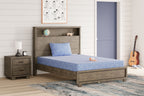 Kids bed mattress and pillow set in blue with wavy pattern