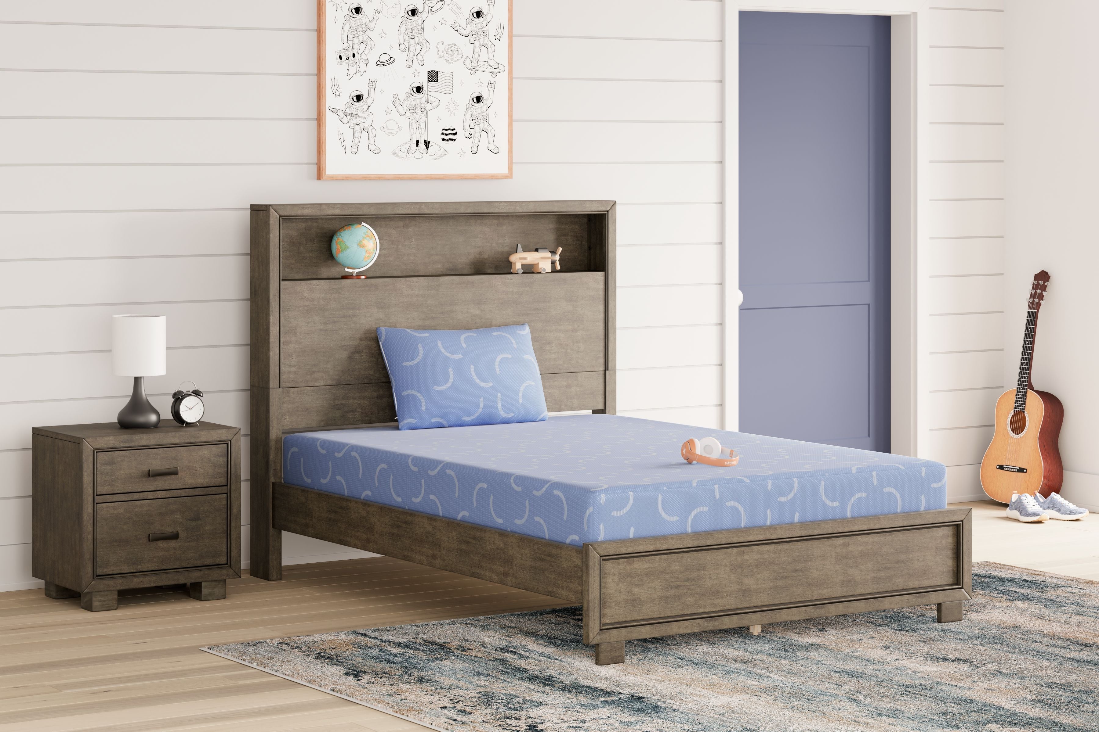 Kids bed mattress and pillow set in blue with wavy pattern