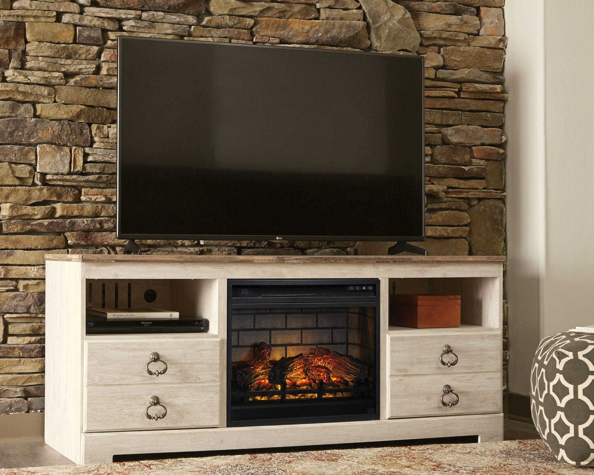 Whitewash TV stand with centered faux fireplace insert and open media shelf
