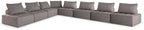 Outdoor sectional seating, dark gray fabric, multiple seat and back cushions
