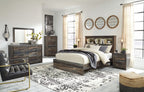 Panel bookcase bed with under-drawer storage, weathered wood frame, white bedding and pillows