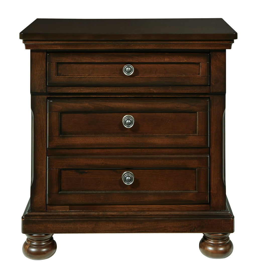 Dark brown night stand with three drawers and round metal pulls