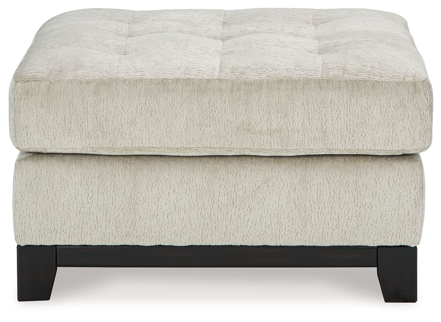 Beige oversized accent ottoman with tufted top and dark wooden legs