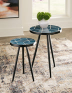 Round accent table pair with teal geometric tops and black tripod legs
