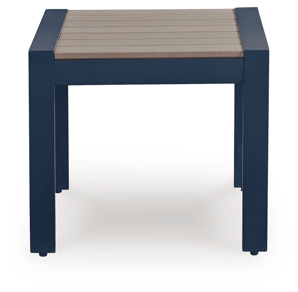 Blue rectangular cocktail table with slatted beige tabletop and four straight legs