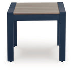Blue rectangular cocktail table with slatted beige tabletop and four straight legs