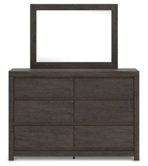 Dark gray panel dresser with eight drawers and square mirror