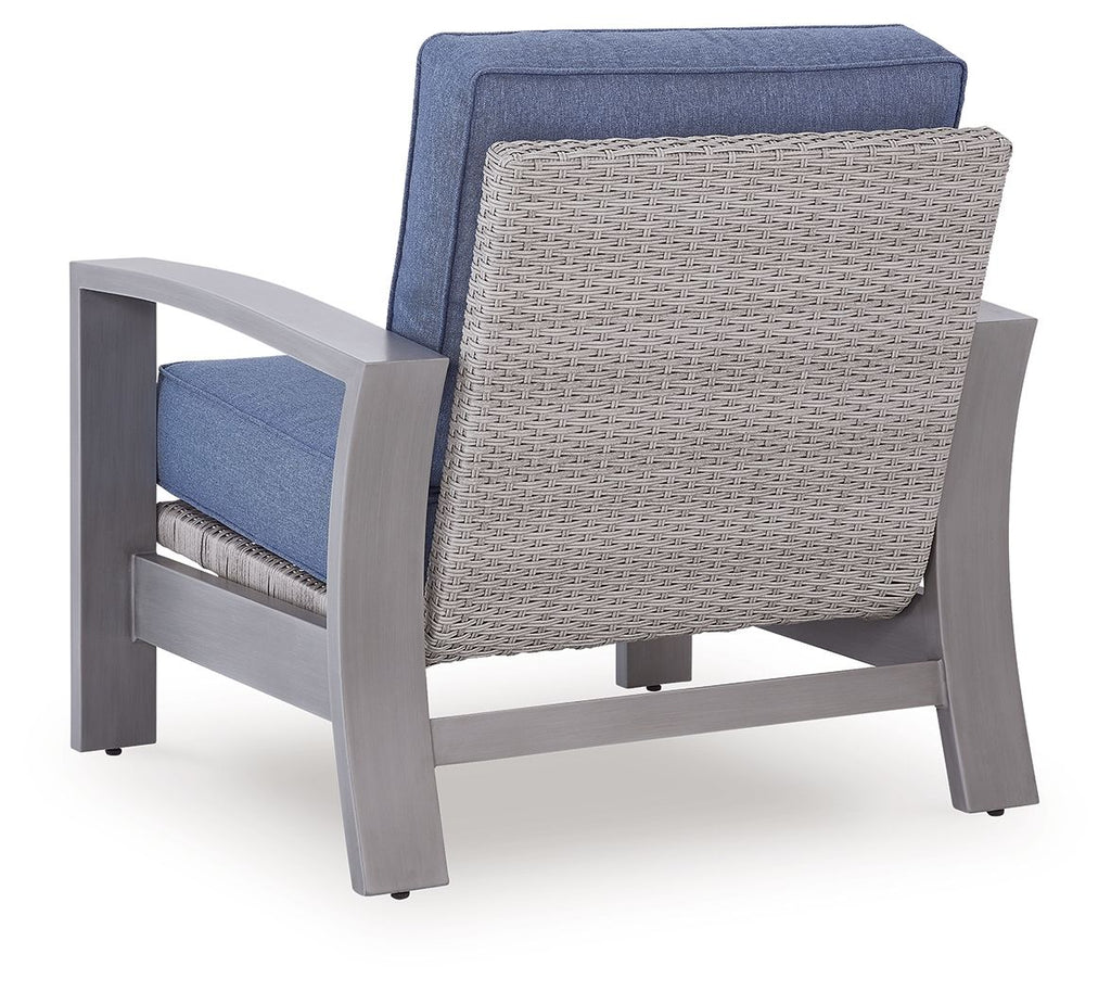 Blue lounge chair with gray frame and woven back panel, cushioned seat and armrests