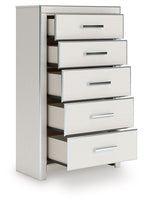 White five-drawer chest with drawers pulled open and silver bar handles
