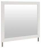 White bedroom mirror with rectangular frame and two bottom corner supports