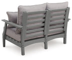 Gray loveseat with cushioned backrest and slatted frame, seat cushions visible