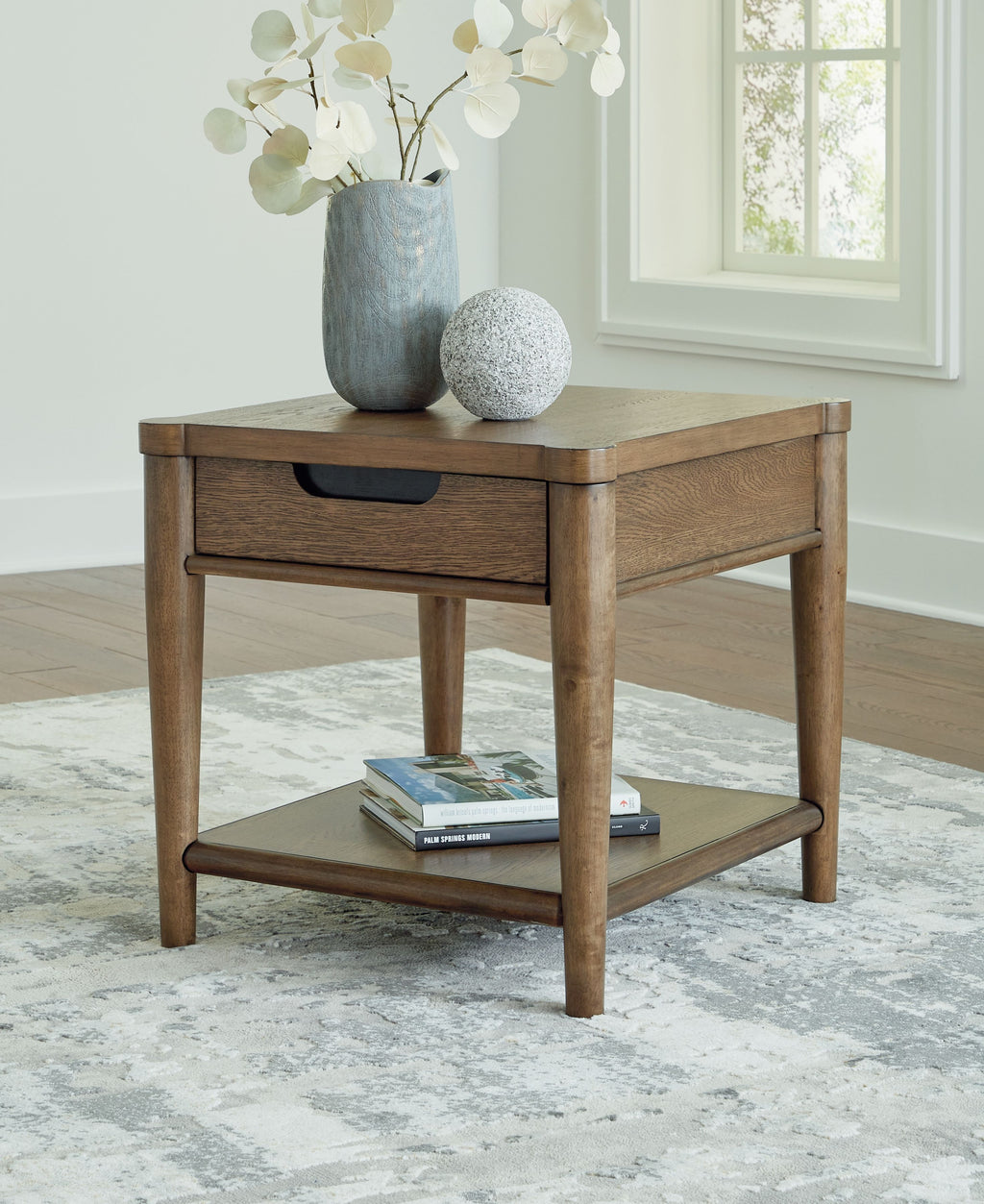 Brown rectangular end table with drawer and open lower shelf