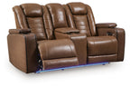 Power reclining loveseat with console and headrests, brown reclining seats