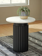 Accent table with round white top and black fluted column base