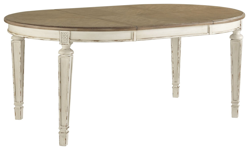 Oval dining table with white turned legs and gray-brown tabletop