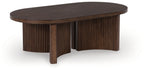 Oval dark brown cocktail table with ribbed wood base and rounded pedestal legs