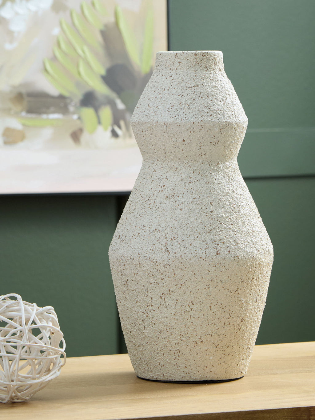 Dawthorne vase in speckled white with rounded shoulders and narrow neck