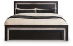 Black panel bed front view with upholstered headboard and side rails, lit trim border