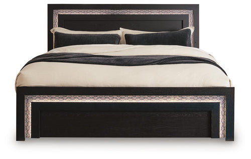 Black panel bed front view with upholstered headboard and side rails, lit trim border