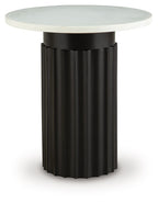 Round white accent table top on black fluted pedestal