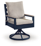 Blue swivel patio chair with beige seat cushion and square arm frames
