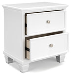 White two-drawer night stand with top drawer ajar and round knobs