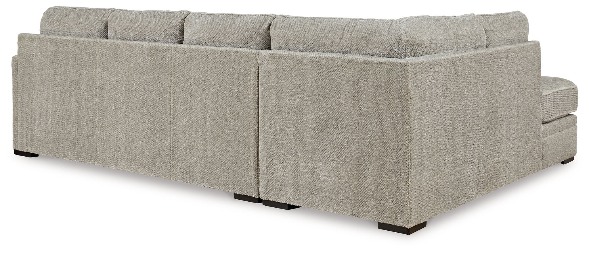 Beige fabric sectional sofa with square arms, back cushions, and low block legs