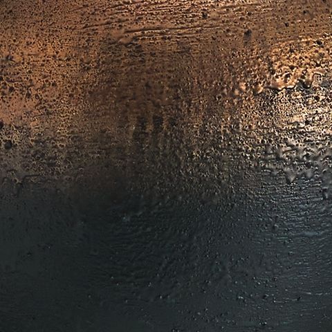 Brown metal lamp base with textured speckling and dark finish