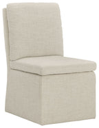 Upholstered dining side chair in oatmeal with tall backrest and cushioned seat