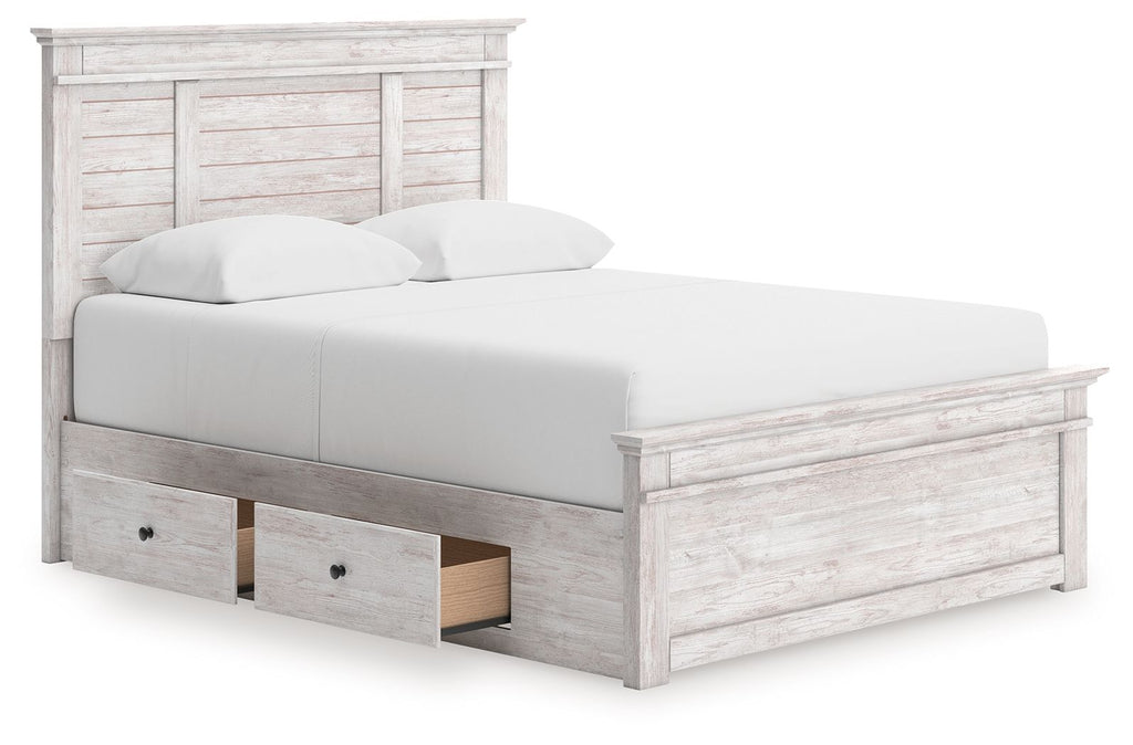 White panel storage bed with a slatted base and two storage drawers on the side rail.
