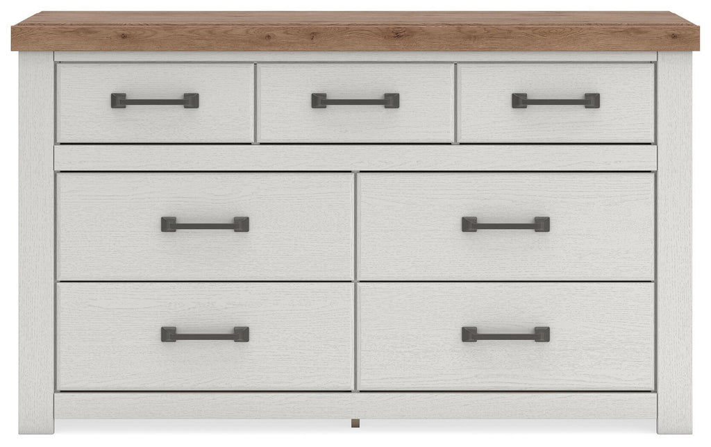 White dresser with wood top and six front drawers, dark bar handles