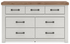 White dresser with wood top and six front drawers, dark bar handles