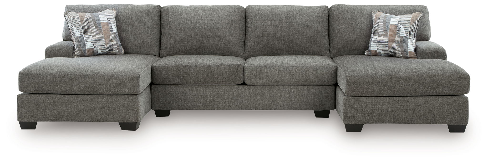 Gray sectional sofa with three-seat back and chaise arms, includes accent pillows