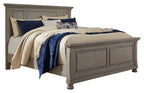 Gray panel bedroom bed with padded bedding, blue and cream throw blankets on top